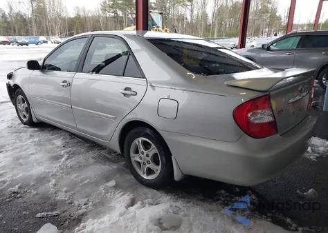 2003 Toyota Camry Le z USA, uszkodzony, nr VIN 4T1BE32K43U222558